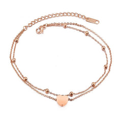 Yellow Chimes Rosegold Anklet for Women Western Style Stainless Steel Never Fading Rose Gold Plated Heart Chain Anklet for Women and Girls.
