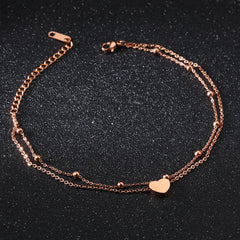 Yellow Chimes Rosegold Anklet for Women Western Style Stainless Steel Never Fading Rose Gold Plated Heart Chain Anklet for Women and Girls.