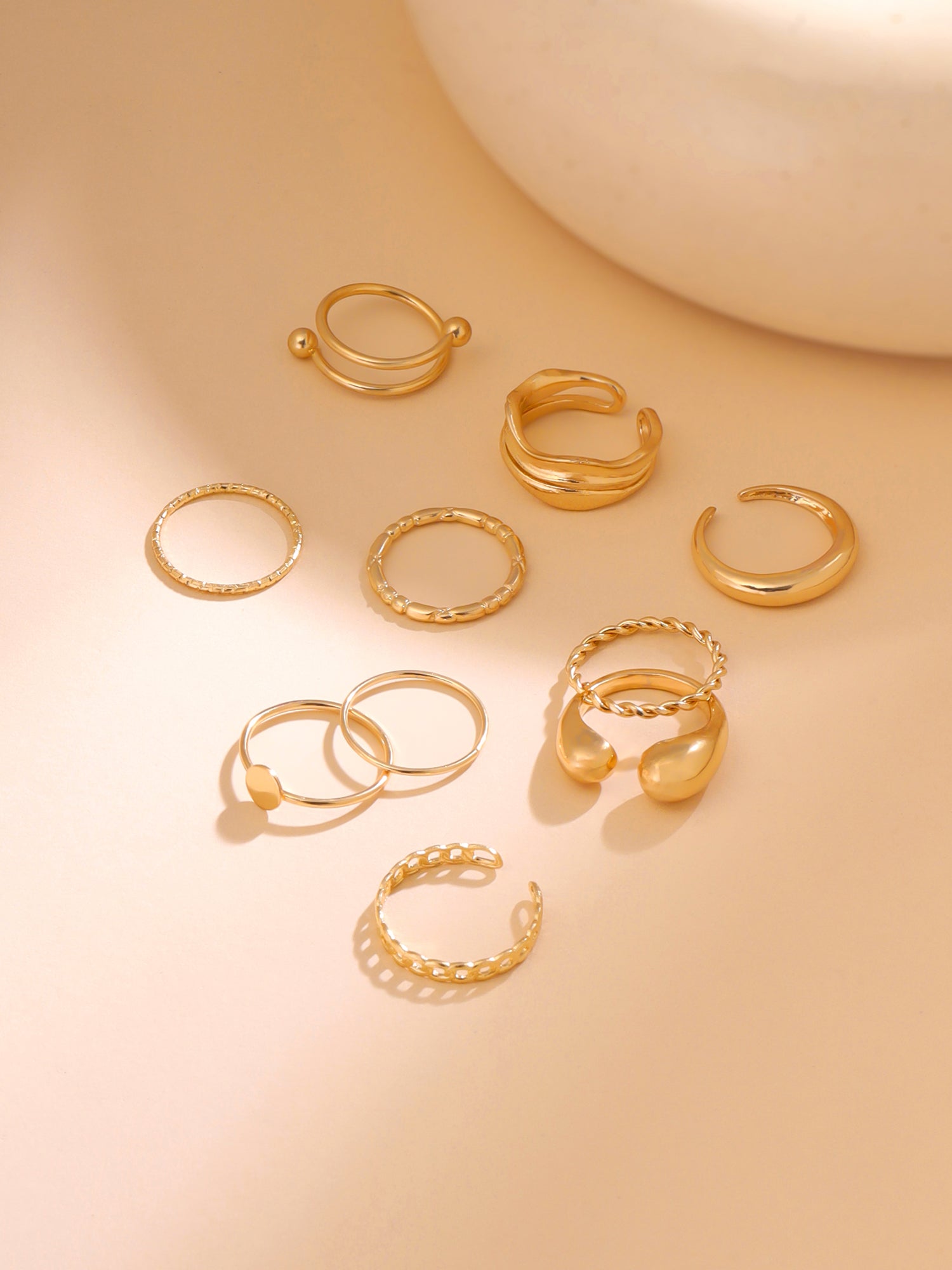 Yellow Chimes gold adjustable rings - versatile accessory for women