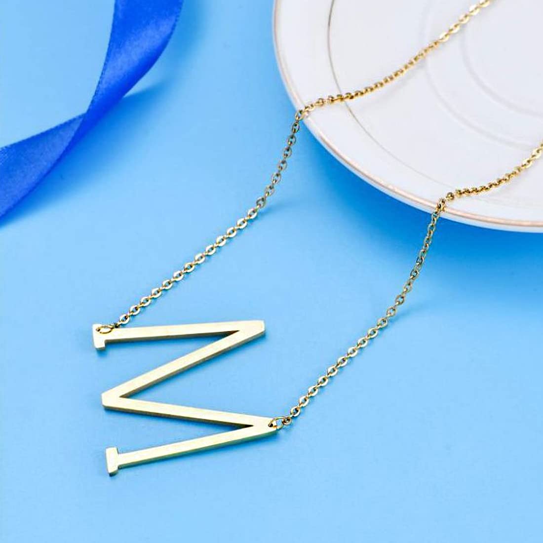 Yellow Chimes Latest Fashion Stainless Steel Gold Plated Initial Pendant with Alphabet M for Women and Girls (YCFJPD-ALPHBTM-GL)