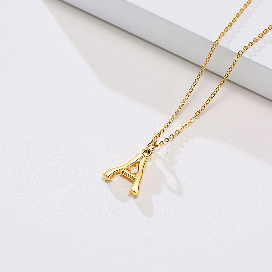 Yellow Chimes Alphabet Pendant Necklace for Women Alphabet A Initial Golden Pendant Stainless Steel Gold Plated Chain Pendant for Women and Men.