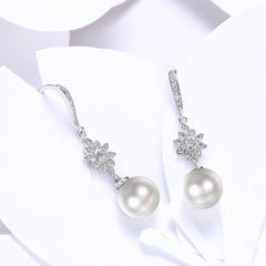 Yellow Chimes Pearl Drop Earrings for Women A5 Grade Crystal Fresh Water Pearl Silver Plated Drop Earrings for Women and Girls.