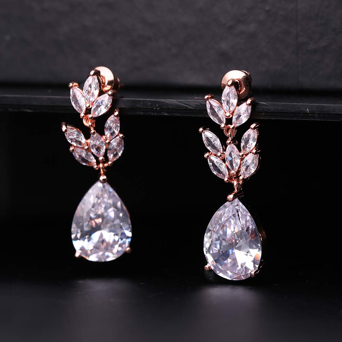 Yellow Chimes Exclusive Crystal from Swarovski Classic Leafy Designe Rose Gold Plated Stylish Dangler Earrings for Women and Girls (Rose Gold)