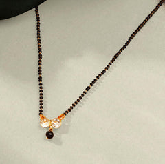 Yellow Chimes Mangalsutra for Women Gold Plated Black Beads Mangal Sutra Pendant Necklace for Women and Girls.