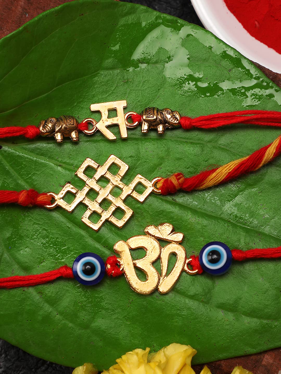 Yellow Chimes Combo of 3 Pcs Handmade Dori Worked Gold Toned OM Initial Letter S and Celtic Design Evil Eye Beads Rakhi for Brother with Roli & Chawal, Red, Gold, Medium (YCTJRK-29BHAY-GL)