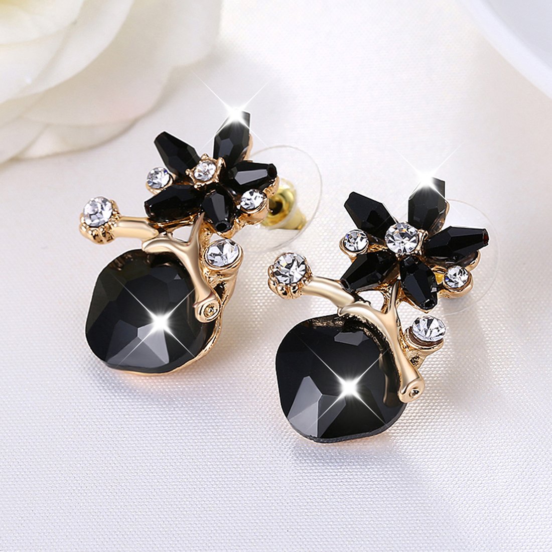 Yellow Chimes Stud Earrings for Women Black Crystal Stud Earrings Floral Shaped Gold Plated Fashion Studs for Women and Girls.