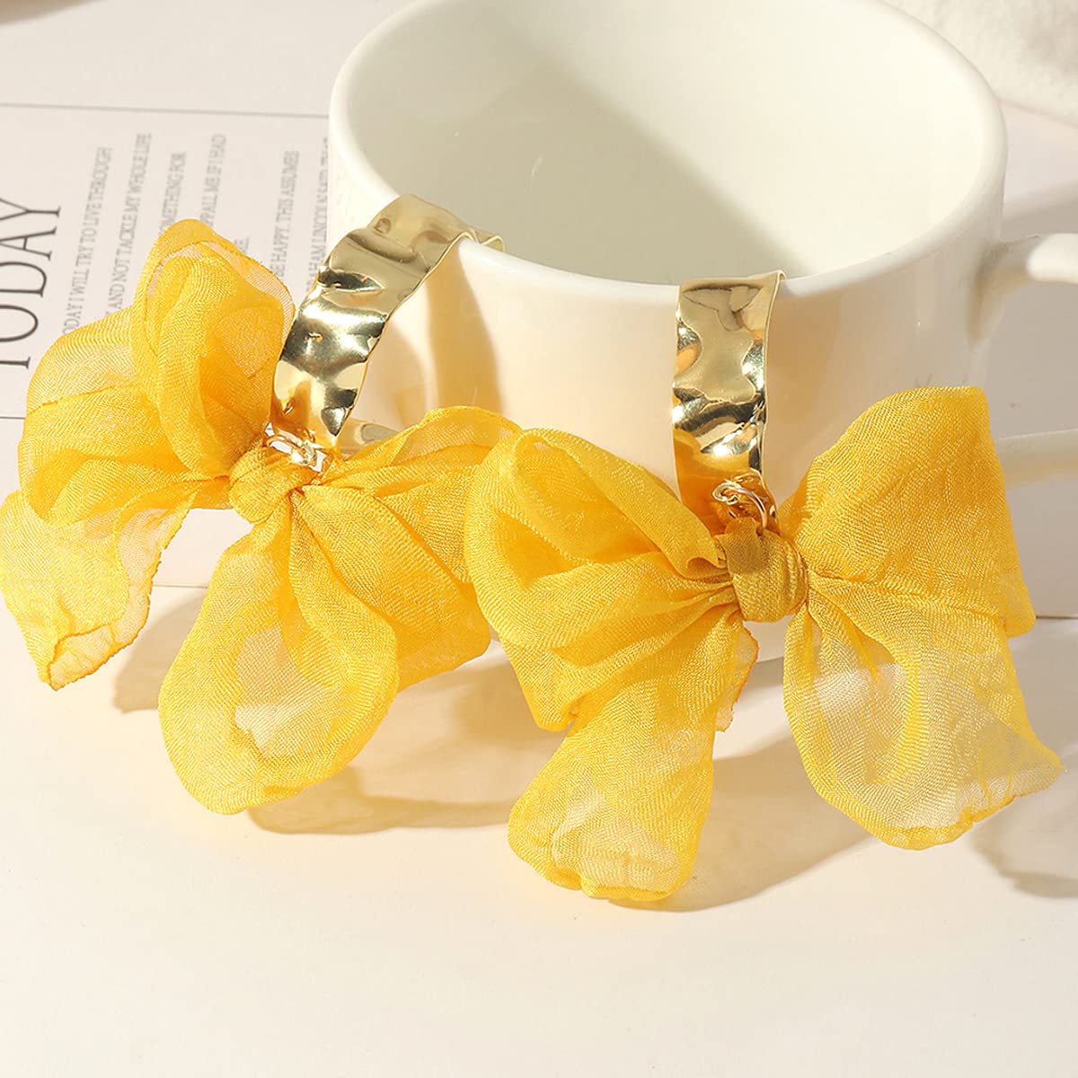 Yellow Chimes Earrings For Women Pink Colored Cloth Woven Bow Shaped Drop Earrings For Women and Girls