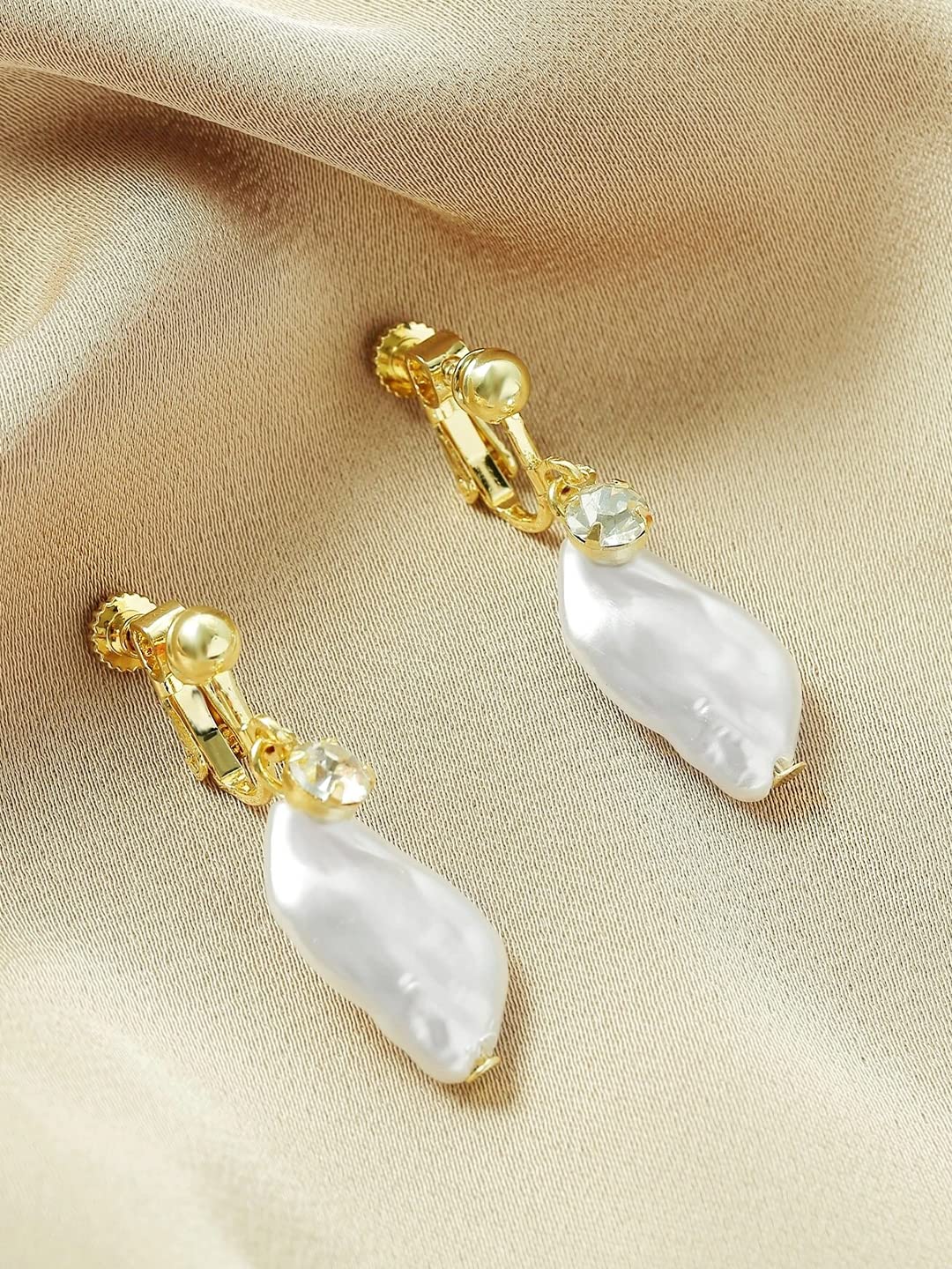 Carolee Designs Inc. (New York, USA) Faux Pearl and Gold Tone Dangle P